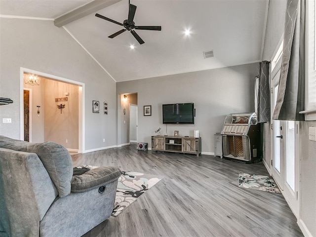 living room featuring ceiling fan, high vaulted ceiling, beamed ceiling, and hardwood / wood-style flooring