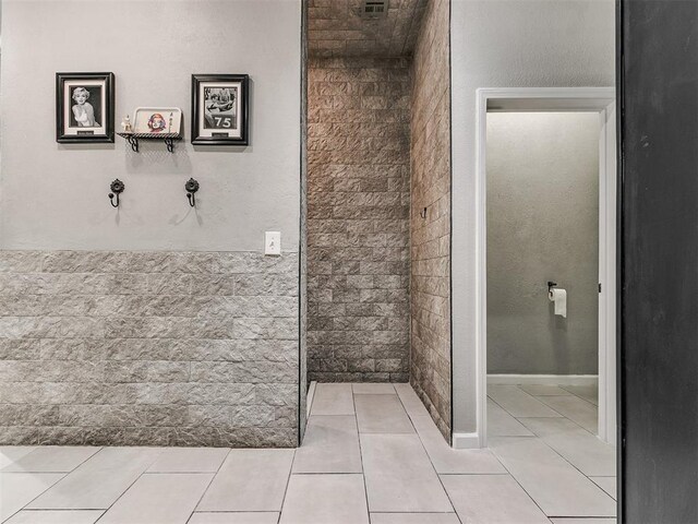 bathroom with tile patterned flooring