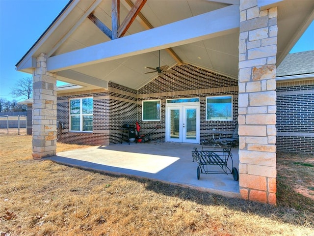 view of patio featuring ceiling fan and french doors