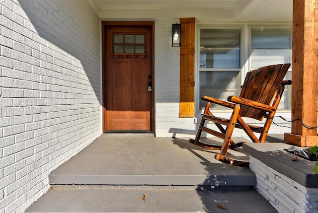 doorway to property featuring covered porch