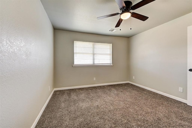 empty room with carpet floors and ceiling fan