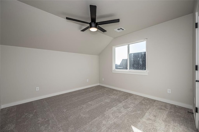 bonus room featuring ceiling fan, carpet, and vaulted ceiling