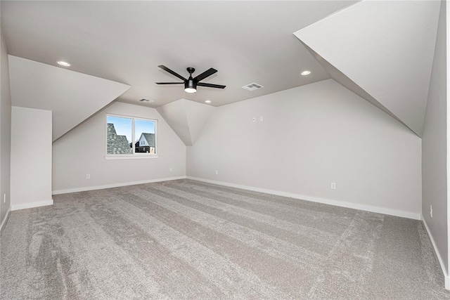 bonus room featuring ceiling fan, carpet flooring, and vaulted ceiling