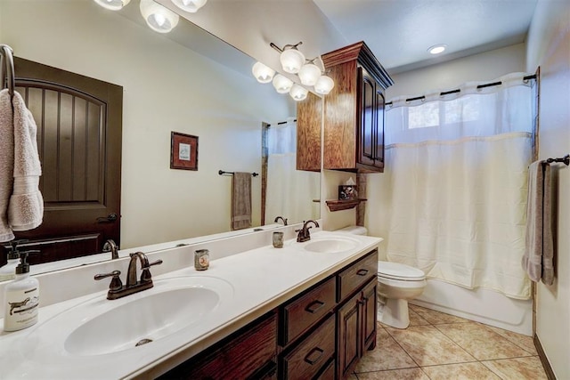 full bathroom featuring tile patterned flooring, vanity, shower / bath combination with curtain, and toilet