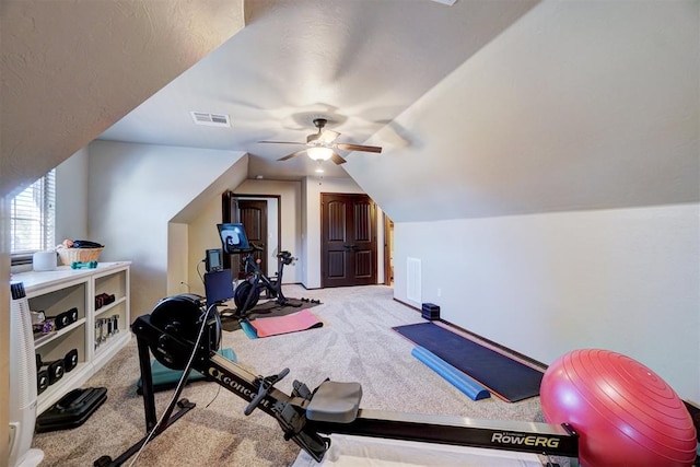 workout room featuring lofted ceiling, carpet floors, and ceiling fan