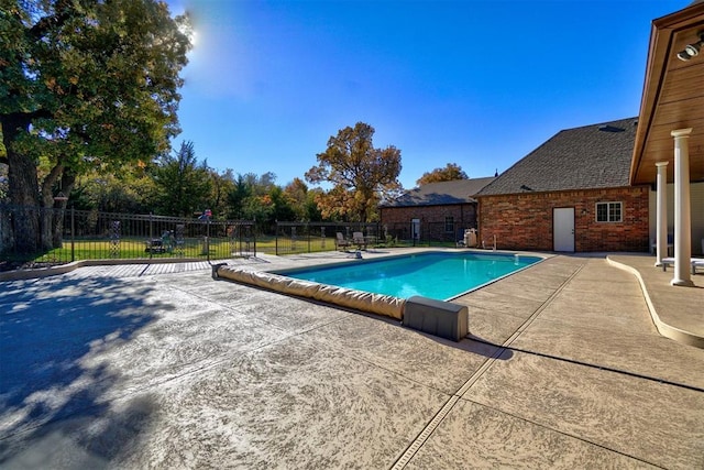 view of pool featuring a patio