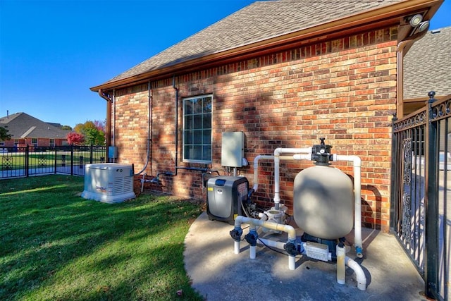 exterior space with a lawn and a patio area