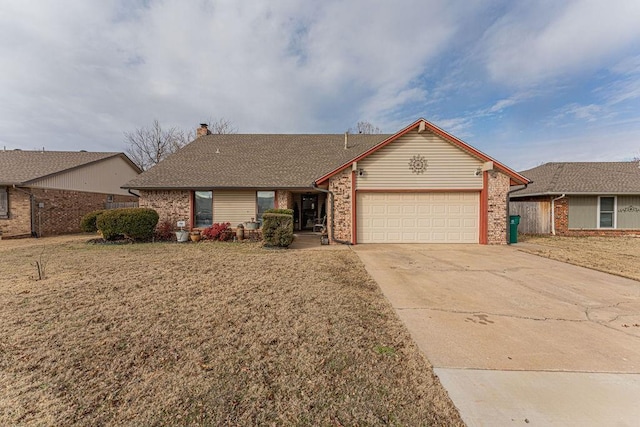 ranch-style home featuring a front yard and a garage