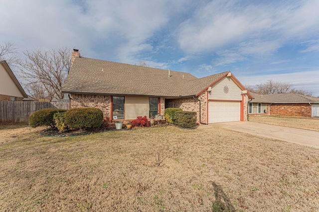 single story home featuring a front yard and a garage