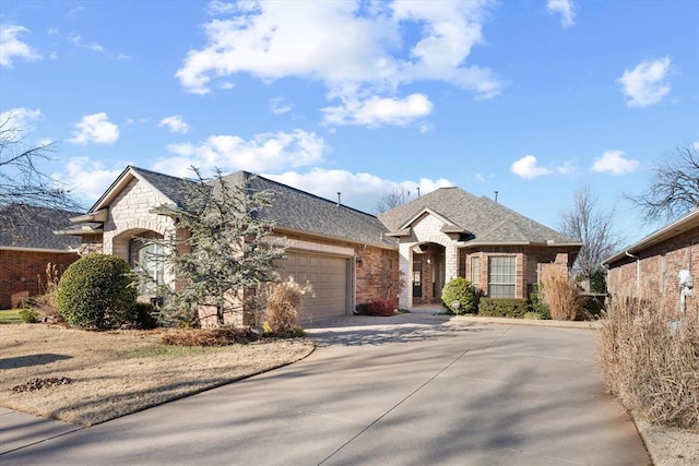 view of front of property with a garage