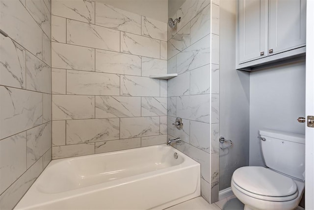 bathroom featuring toilet and tiled shower / bath combo