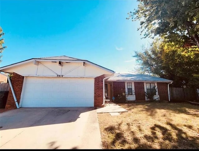 single story home with a garage