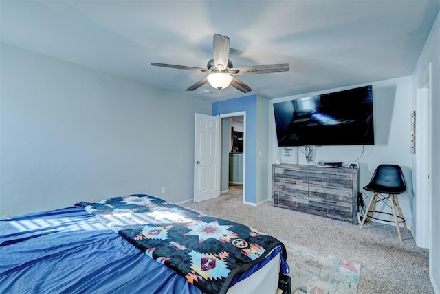 bedroom featuring light colored carpet and ceiling fan