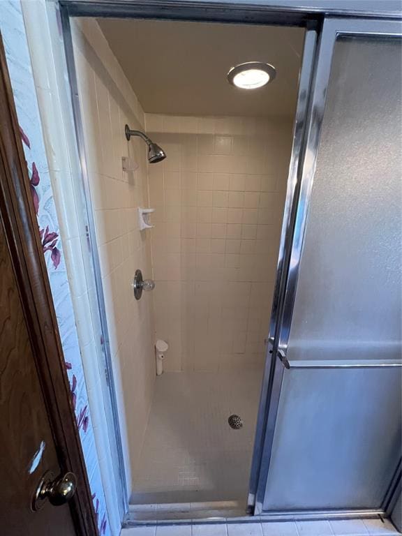 bathroom featuring a stall shower