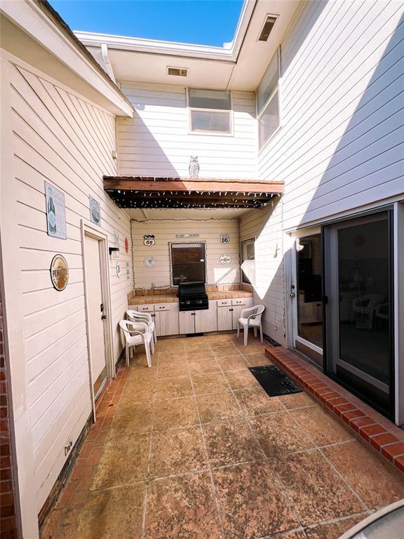 view of patio with exterior kitchen and area for grilling