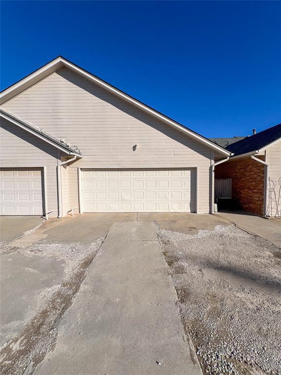 exterior space with a garage