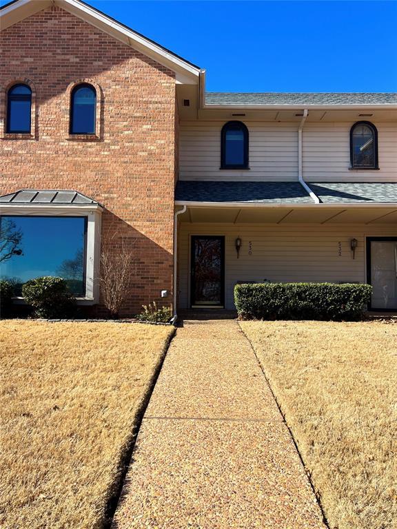 view of front of property with brick siding