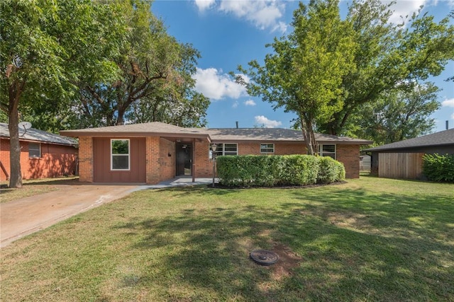 single story home with a front yard