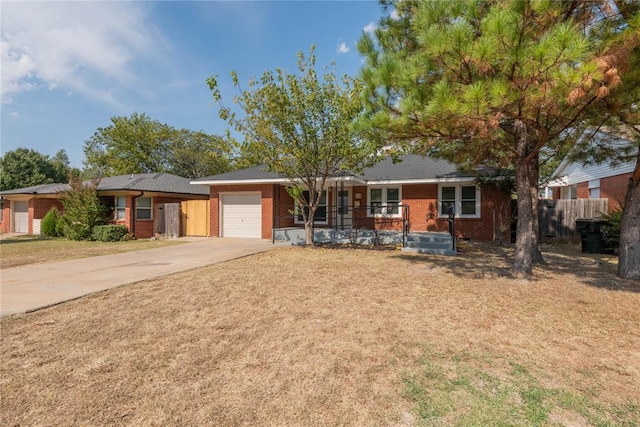 ranch-style house featuring a garage and a porch