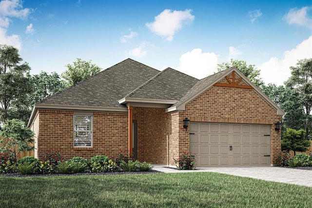 view of front of property featuring a garage and a front yard