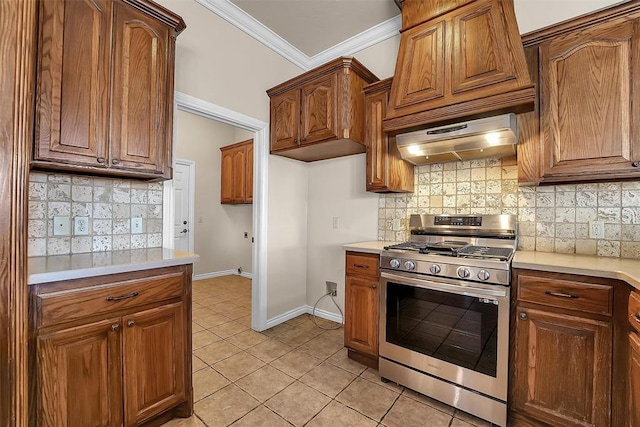 kitchen with backsplash, extractor fan, gas stove, and ornamental molding