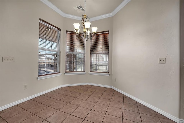 empty room featuring light tile patterned floors, crown molding, and an inviting chandelier