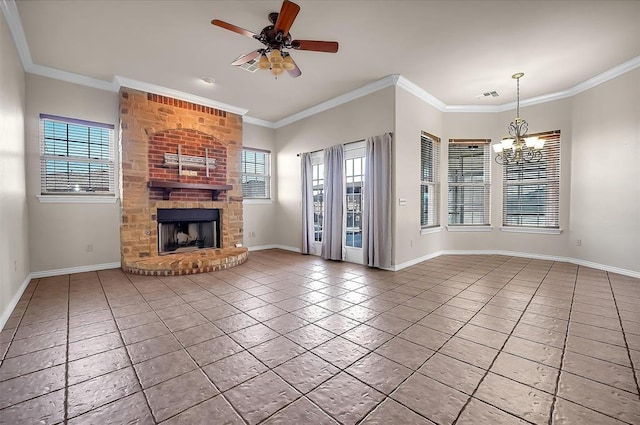 unfurnished living room featuring ceiling fan with notable chandelier, tile patterned floors, crown molding, and a fireplace