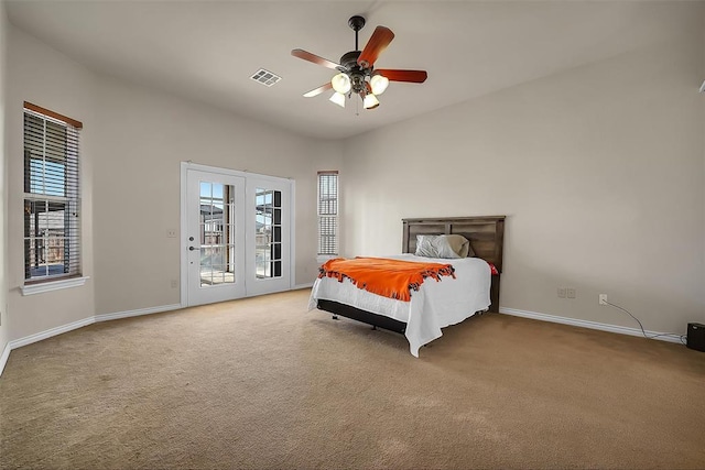 carpeted bedroom featuring ceiling fan and access to exterior