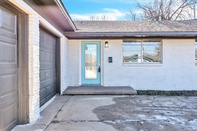 entrance to property with a garage