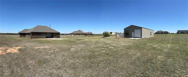 view of yard featuring a garage