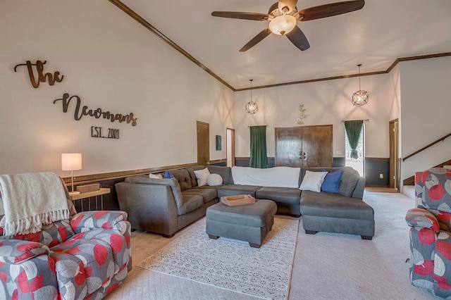 living room featuring ceiling fan and ornamental molding