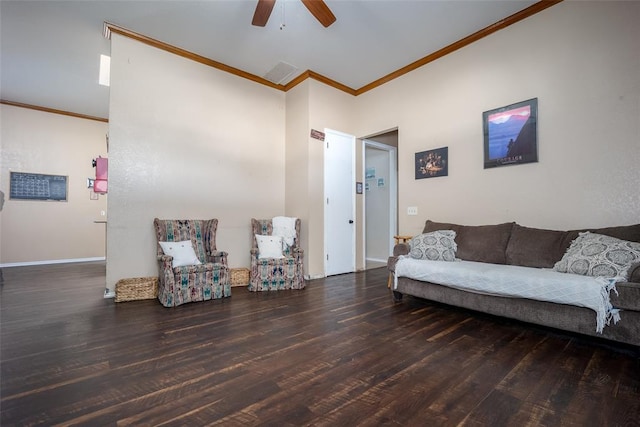 living room with ceiling fan, ornamental molding, and dark hardwood / wood-style flooring