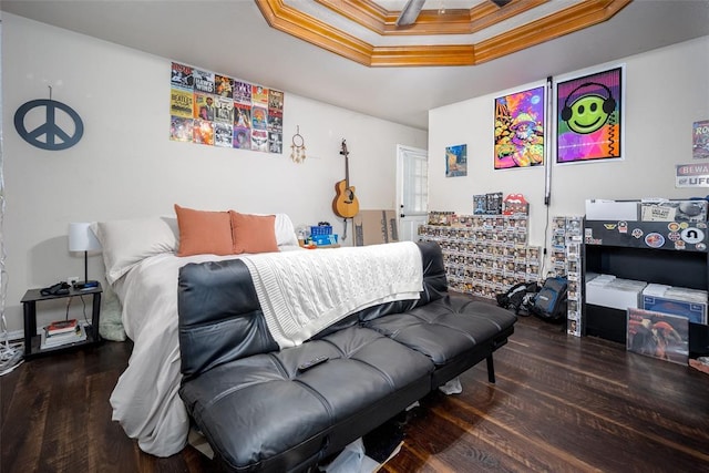 bedroom with wood-type flooring and ornamental molding