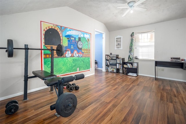 workout room with a textured ceiling, ceiling fan, dark hardwood / wood-style flooring, and lofted ceiling