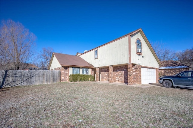 view of home's exterior with a lawn and a garage