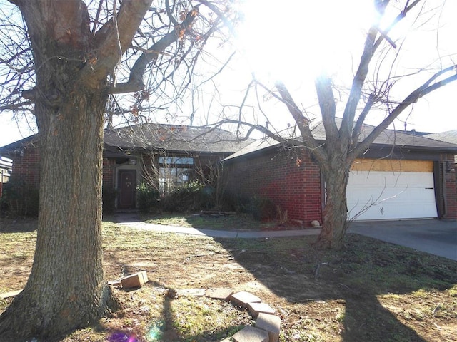 view of side of property featuring a garage