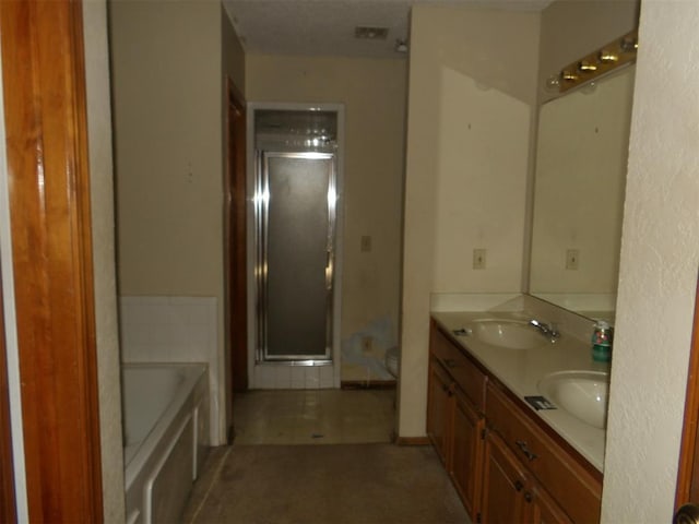 full bathroom featuring tile patterned floors, toilet, vanity, and independent shower and bath