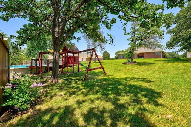 view of yard with a playground