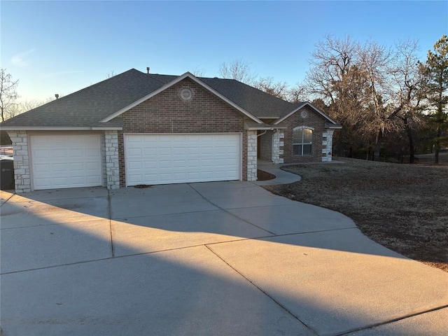 ranch-style house featuring a garage