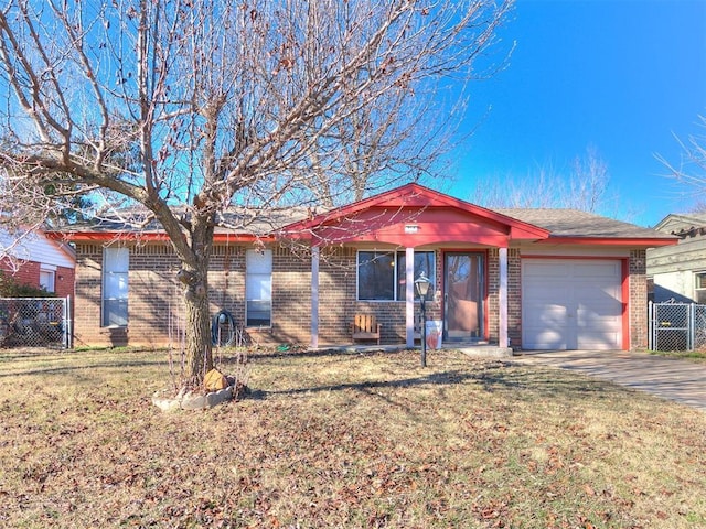 single story home featuring a front yard and a garage