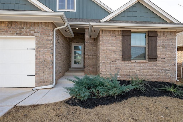 entrance to property featuring a garage