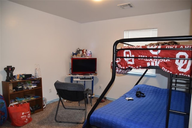 bedroom featuring carpet