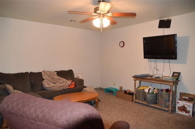 living room with carpet and ceiling fan