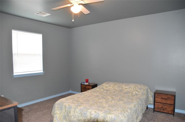 bedroom with ceiling fan and carpet floors