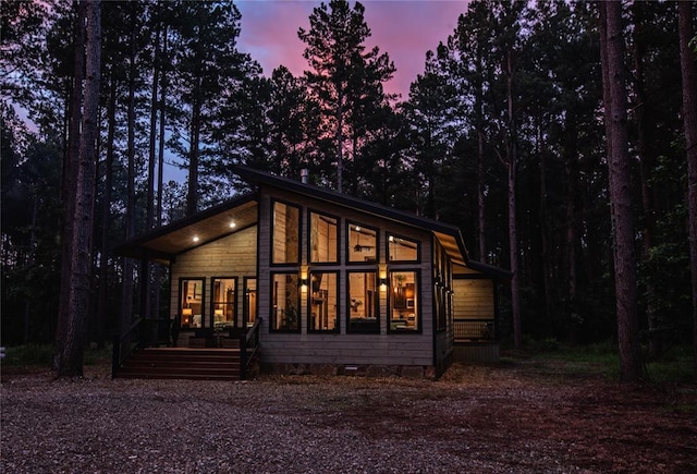 back of house featuring crawl space