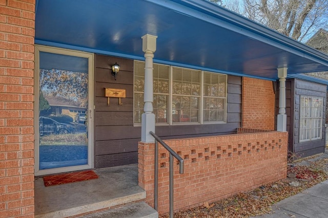 property entrance with a porch