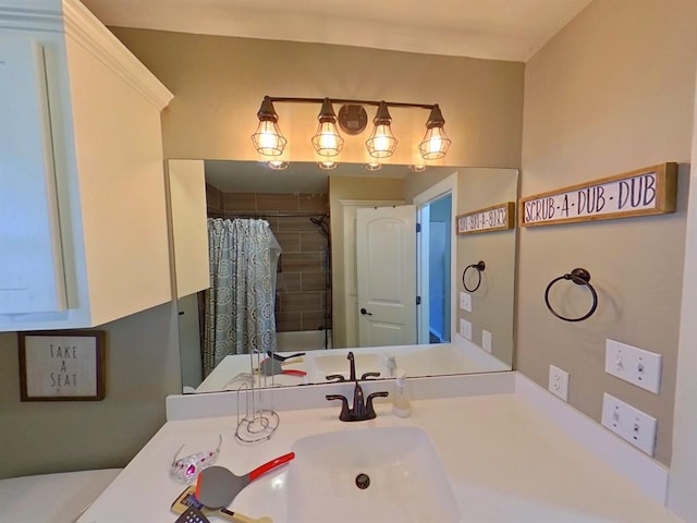 bathroom featuring vanity and walk in shower