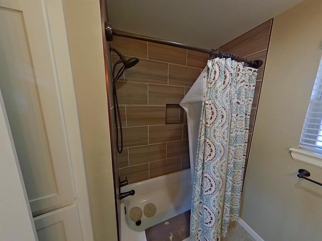 bathroom featuring shower / bath combination with curtain