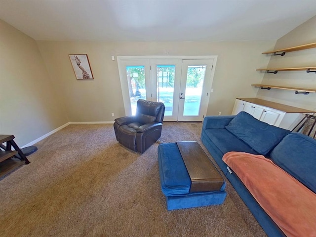 living room featuring carpet and french doors