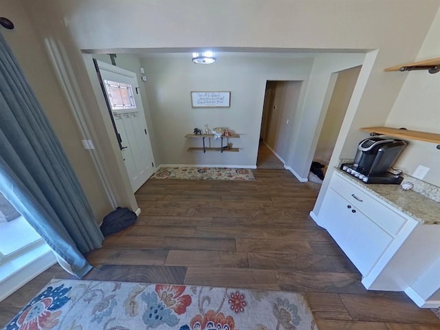 hall featuring dark hardwood / wood-style floors